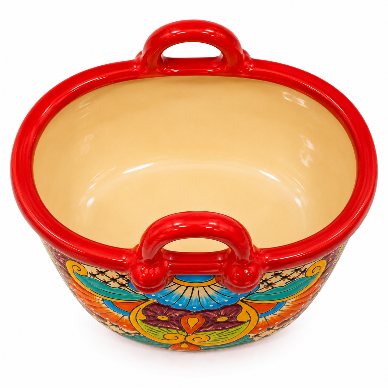 A decorative ceramic bowl with a glossy red rim and handles, featuring a cream-colored interior and a vibrant, multicolored hand-painted pattern on the exterior.